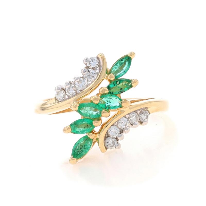 Size: 7
Sizing Fee: Up 2 sizes for $35 or Down 1 size for $35

Metal Content: 14k Yellow Gold & 14k White Gold

Stone Information

Natural Emeralds
Treatment: Oiling
Carat(s): .54ctw
Cut: Marquise
Color: Green

Natural Diamonds
Carat(s): .20ctw
Cut: