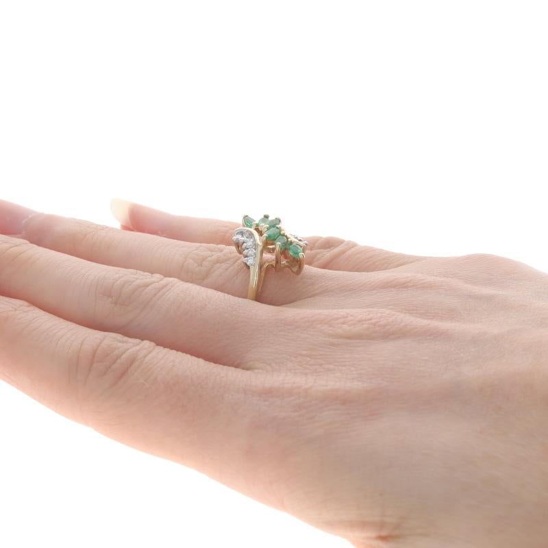 Women's Yellow Gold Emerald Diamond Bypass Ring - 14k Marquise .74ctw Six-Stone For Sale
