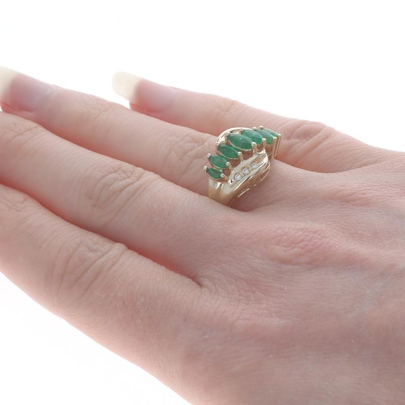 Yellow Gold Emerald & Diamond Bypass Ring - 14k Marquise .78ctw Seven-Stone In Excellent Condition For Sale In Greensboro, NC