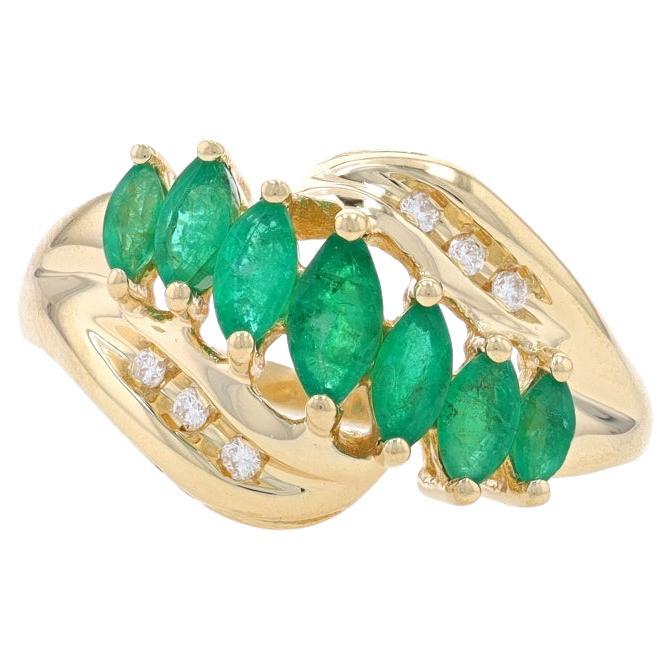 Yellow Gold Emerald & Diamond Bypass Ring - 14k Marquise .78ctw Seven-Stone For Sale