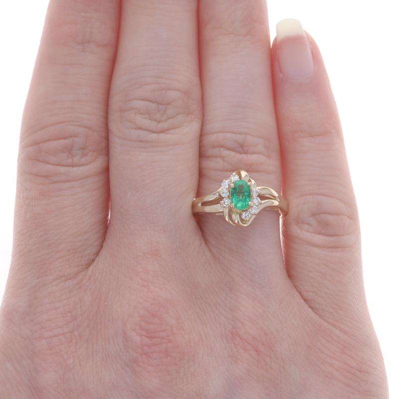 Oval Cut Yellow Gold Emerald Diamond Bypass Ring - 14k Oval .40ctw For Sale