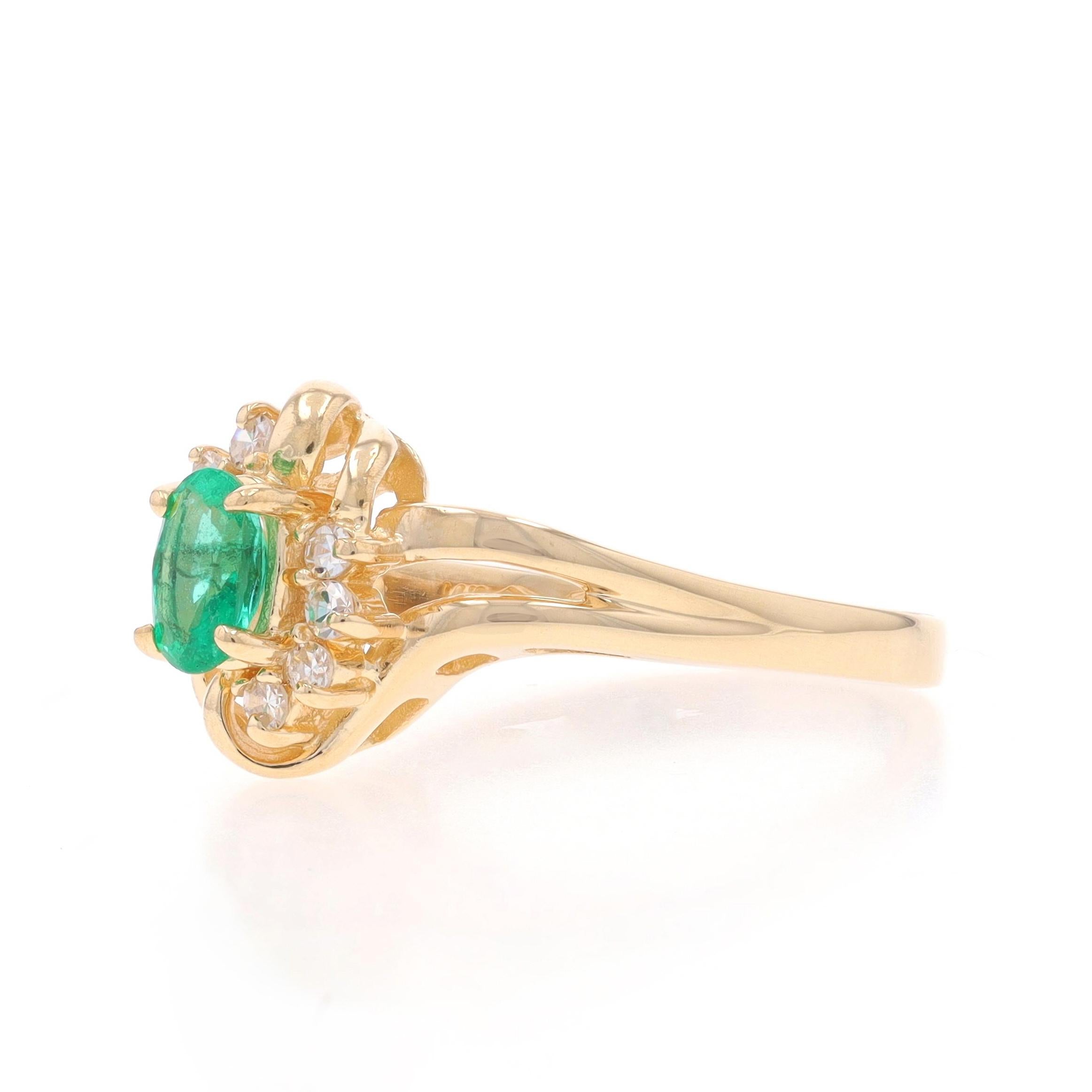 Yellow Gold Emerald Diamond Bypass Ring - 14k Oval .40ctw In Excellent Condition For Sale In Greensboro, NC