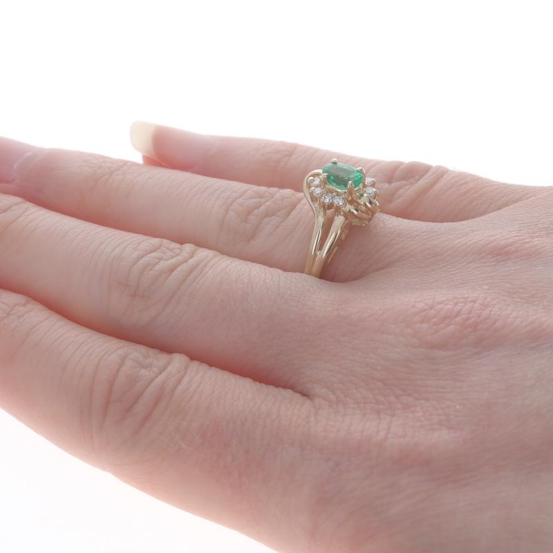 Women's Yellow Gold Emerald Diamond Bypass Ring - 14k Oval .40ctw For Sale