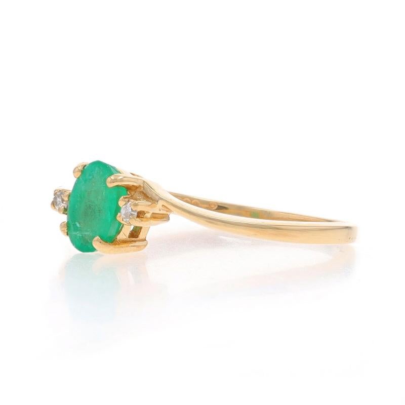 Yellow Gold Emerald Diamond Bypass Ring - 14k Oval .54ctw In Excellent Condition For Sale In Greensboro, NC
