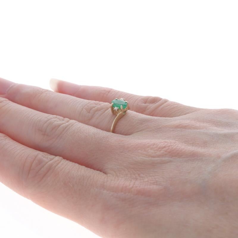 Women's Yellow Gold Emerald Diamond Bypass Ring - 14k Oval .54ctw For Sale