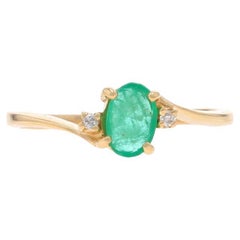 Bypass-Ring aus Gelbgold mit Smaragd und Diamant - 14k Oval .54ctw