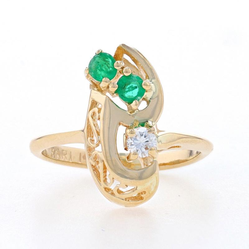 Size: 3 1/4
Sizing Fee: Up 2 sizes for $35 or Down 1 size for $30

Metal Content: 14k Yellow Gold

Stone Information

Natural Emeralds
Treatment: Oiling
Carat(s): .16ctw
Cut: Round
Color: Green

Natural Diamond
Carat(s): .07ct
Cut: Round