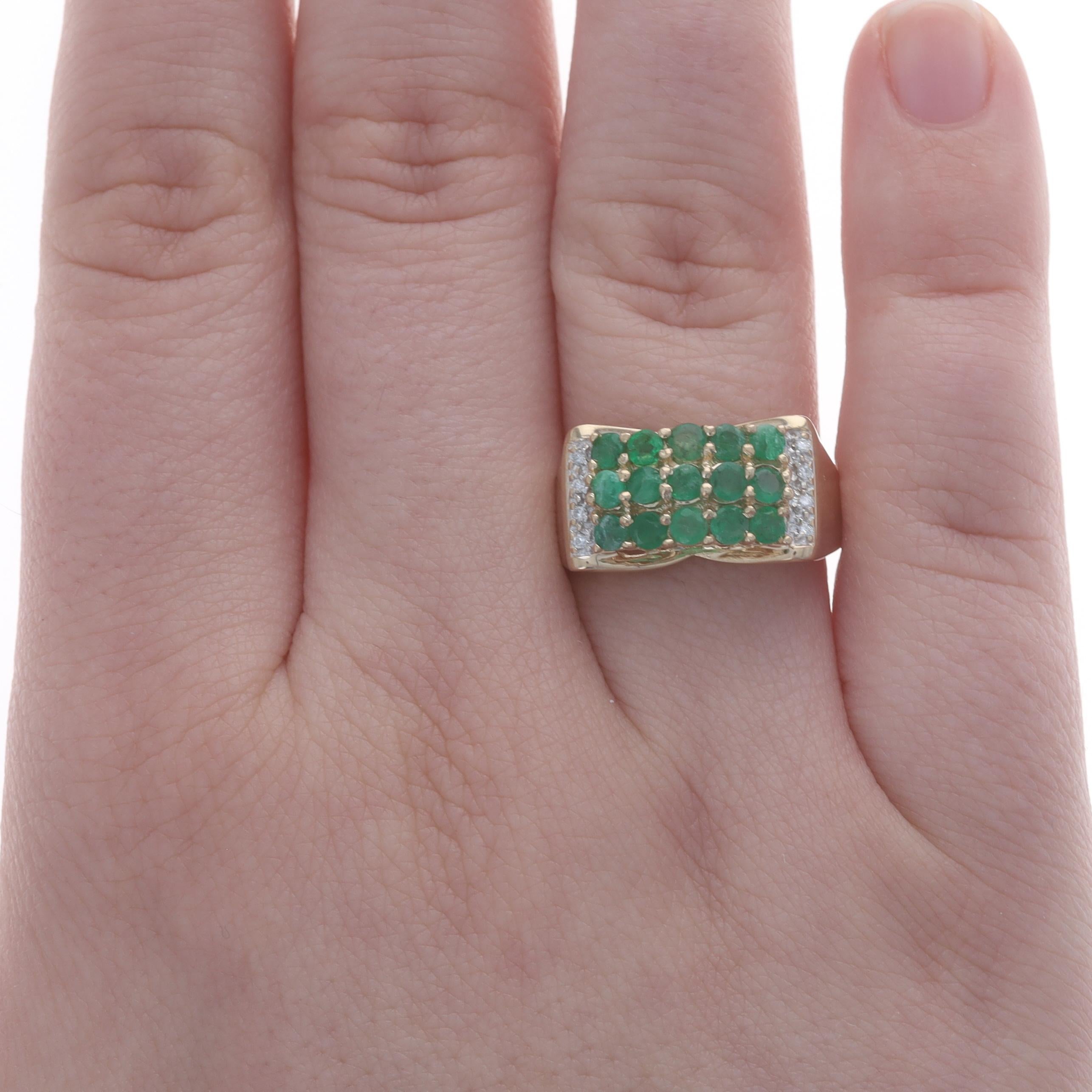 Size: 7
Sizing Fee: Up 2 sizes for $35 or Down 1 1/2 sizes for $30

Metal Content: 14k Yellow Gold & 14k White Gold

Stone Information
Natural Emeralds
Treatment: Oiling
Carat(s): 1.20ctw
Cut: Round
Color: Green

Natural Diamonds
Carat(s):