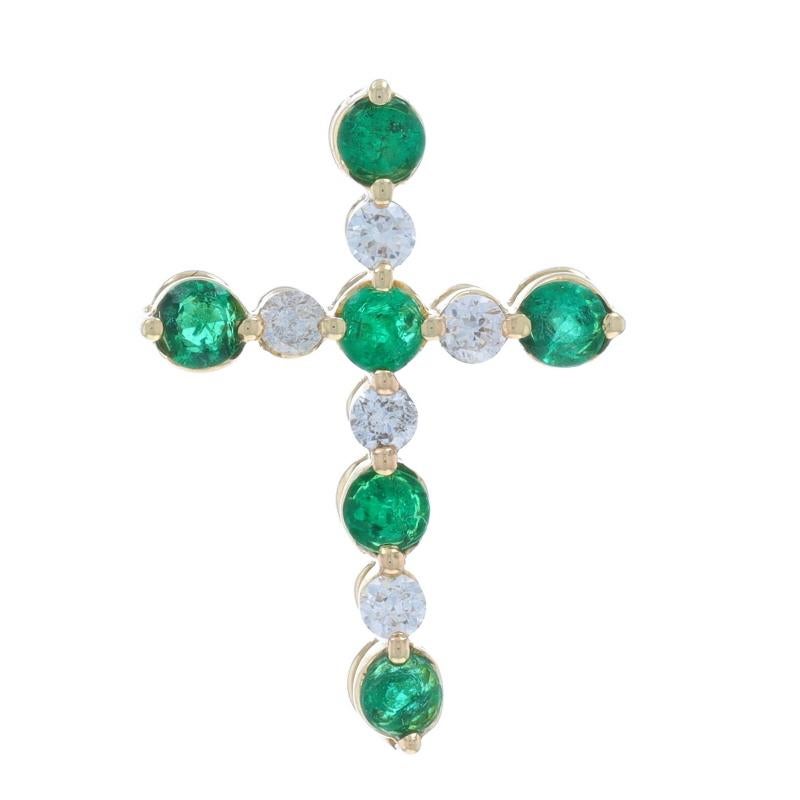 Metal Content: 14k Yellow Gold

Stone Information

Natural Emeralds
Treatment: Oiling
Carat(s): .40ctw
Cut: Round

Natural Diamonds
Carat(s): .15ctw
Cut: Round Brilliant
Color: H - I
Clarity: SI2 - I1

Total Carats: .55ctw

Theme: Cross,