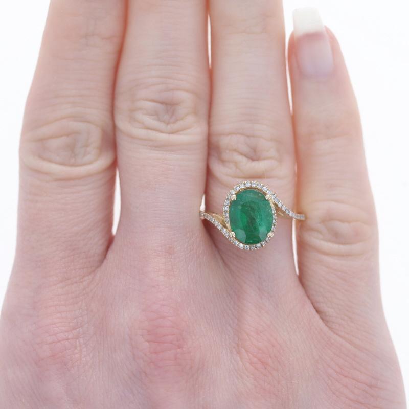 Size: 6 1/2
Sizing Fee: Up 2 sizes for $35

Metal Content: 14k Yellow Gold

Stone Information
Natural Emerald
Treatment: Oiling
Carat(s): 2.30ct
Cut: Oval
Color: Green

Natural Diamonds
Carat(s): .20ctw
Cut: Single
Color: G - H
Clarity: SI1 -