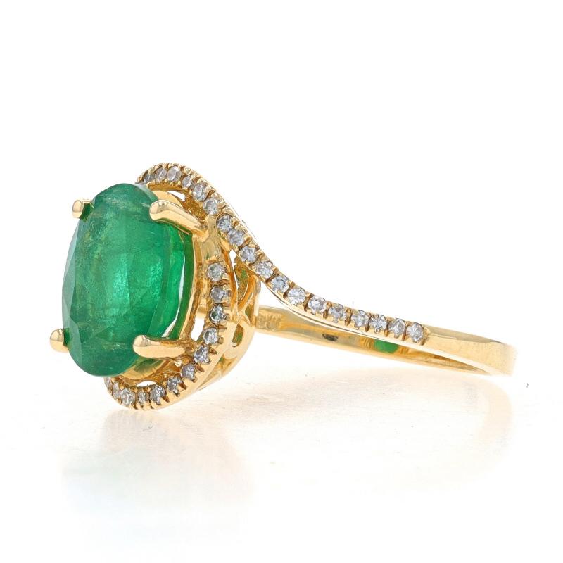 Oval Cut Yellow Gold Emerald & Diamond Halo Bypass Ring - 14k Oval 2.50ctw For Sale