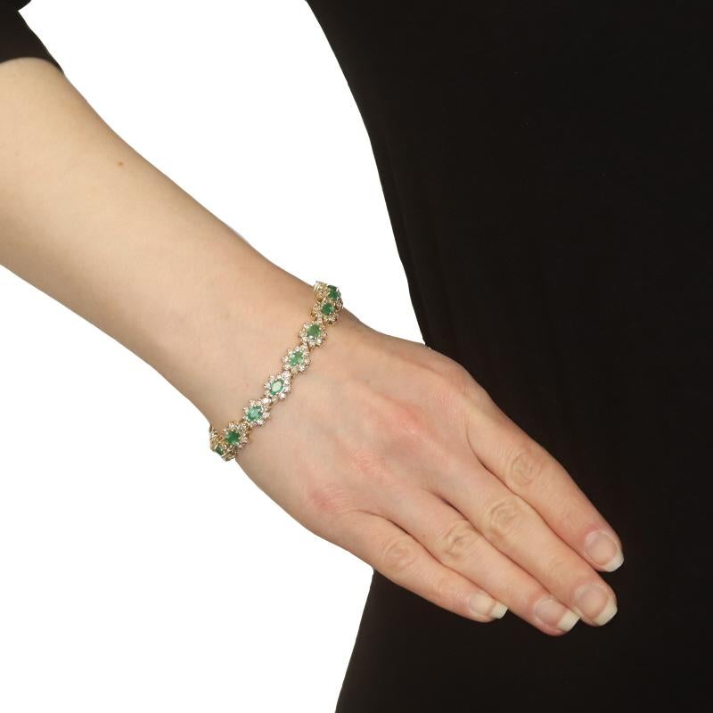Oval Cut Yellow Gold Emerald & Diamond Halo Link Bracelet 7