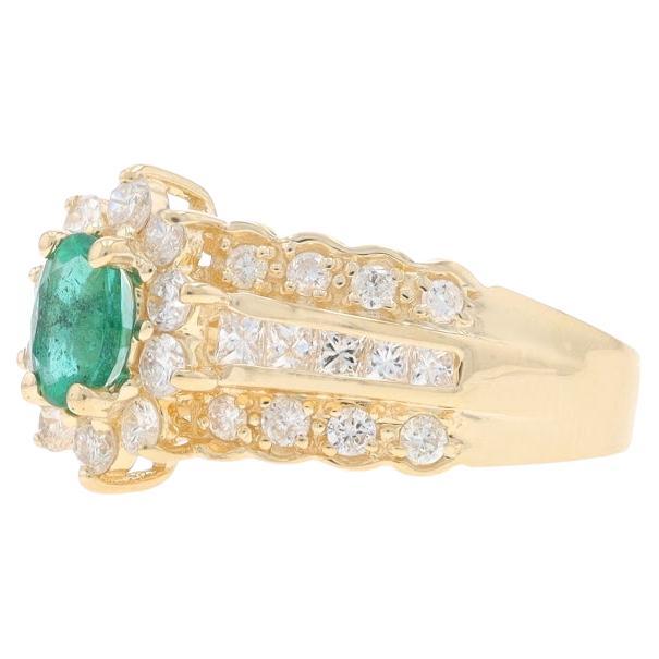 Size: 6 1/2
Sizing Fee: Up 1/2 a size for $40 or Down 1/2 a size for $40

Metal Content: 14k Yellow Gold

Stone Information

Natural Emerald
Treatment: Oiling
Carat(s): .60ct
Cut: Oval
Color: Green

Natural Diamonds
Carat(s): 1.04ctw
Cut: Round