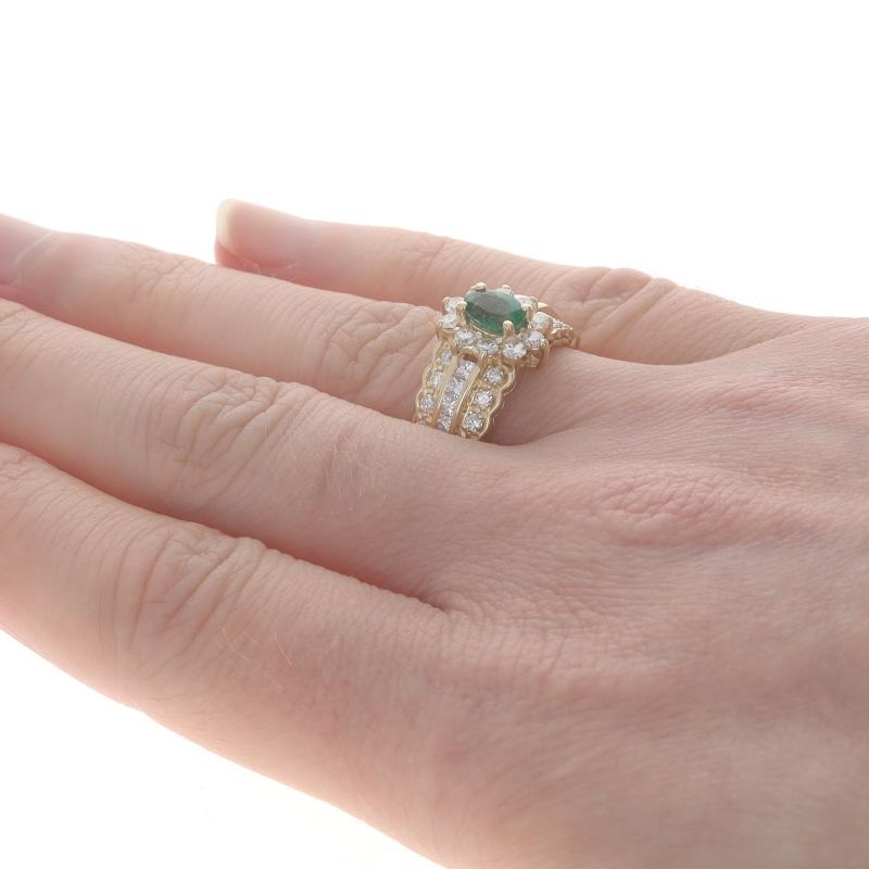 Oval Cut Yellow Gold Emerald & Diamond Halo Ring - 14k Oval 1.64ctw Floral For Sale