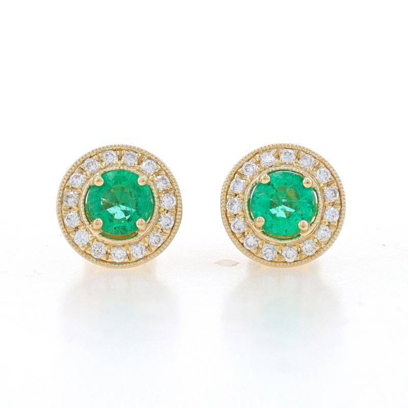 Metal Content: 14k Yellow Gold

Stone Information
Natural Emeralds
Treatment: Oiling
Carat(s): .88ctw
Cut: Round
Color: Green

Natural Diamonds
Carat(s): .25ctw
Cut: Round Brilliant
Color: G
Clarity: SI1

Total Carats: 1.13ctw

Style: Halo