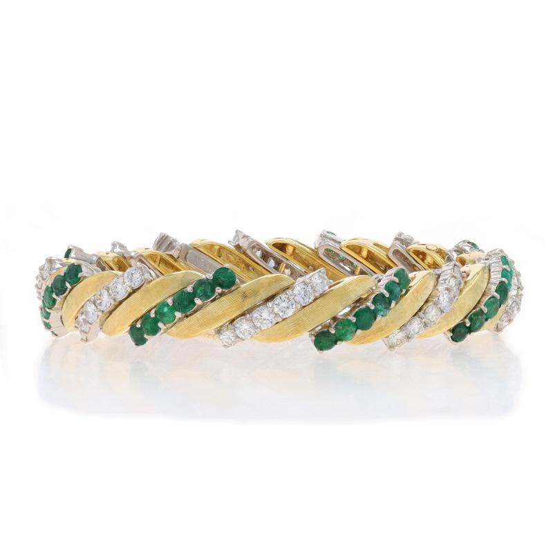 Era: Vintage

Metal Content: 18k Yellow Gold & 900 Platinum

Stone Information

Natural Emeralds
Treatment: Oiling
Carat(s): 5.76ctw
Cut: Round
Color: Green

Natural Diamonds
Carat(s): 4.32ctw
Cut: Round Brilliant
Color: F - G - H
Clarity: VS1 -