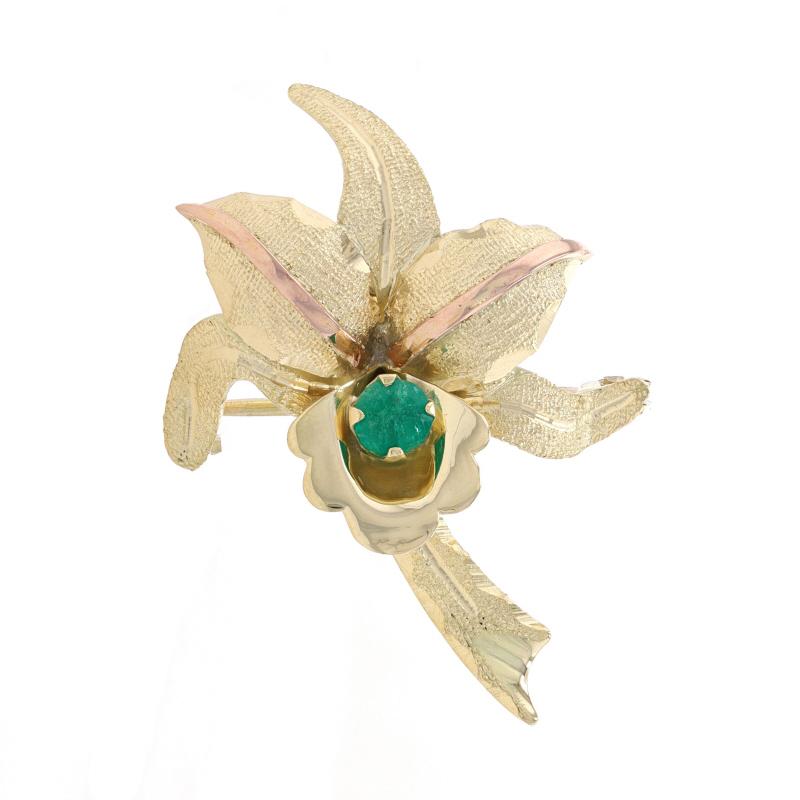 Metal Content: 18k Yellow Gold & 18k Rose Gold

Stone Information
Natural Emerald
Treatment: Oiling
Carat(s): .22ct
Cut: Round
Color: Green

Total Carats: .22ct

Style: Brooch/Pendant
Fastening Type: Hinged Pin and Whale Tail Clasp
Theme: Flower,