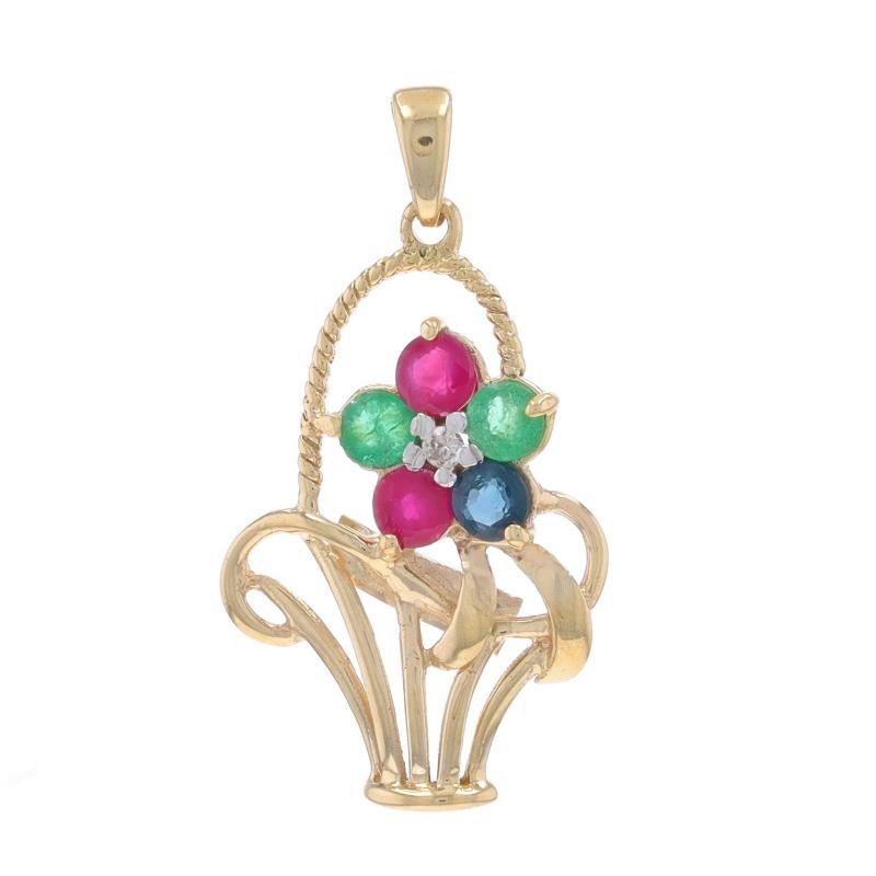 Metal Content: 10k Yellow Gold & 10k White Gold

Stone Information

Natural Emeralds
Treatment: Oiling
Carat(s): .08ctw
Cut: Round

Natural Rubies
Treatment: Heating
Carat(s): .16ctw
Cut: Round

Natural Sapphire
Treatment: Heating
Carat(s):