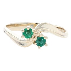 Yellow Gold Emerald Two-Stone Bypass Ring - 14k Round Cut .30ctw