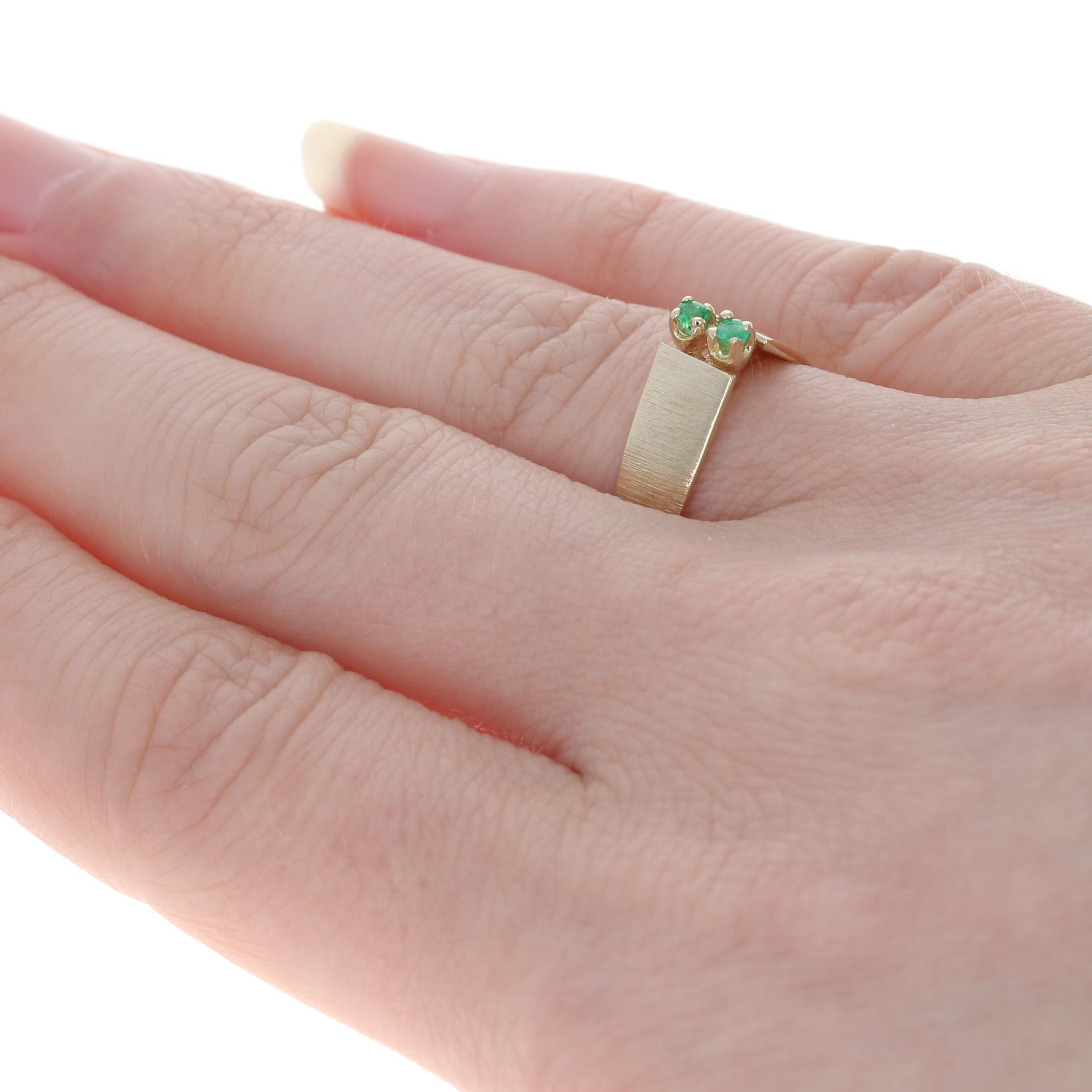 Yellow Gold Emerald Two-Stone Ring, 14k Round Cut Brushed Cathedral In Excellent Condition In Greensboro, NC