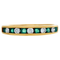 Vintage Yellow gold emeralds and diamonds semi eternity band ring