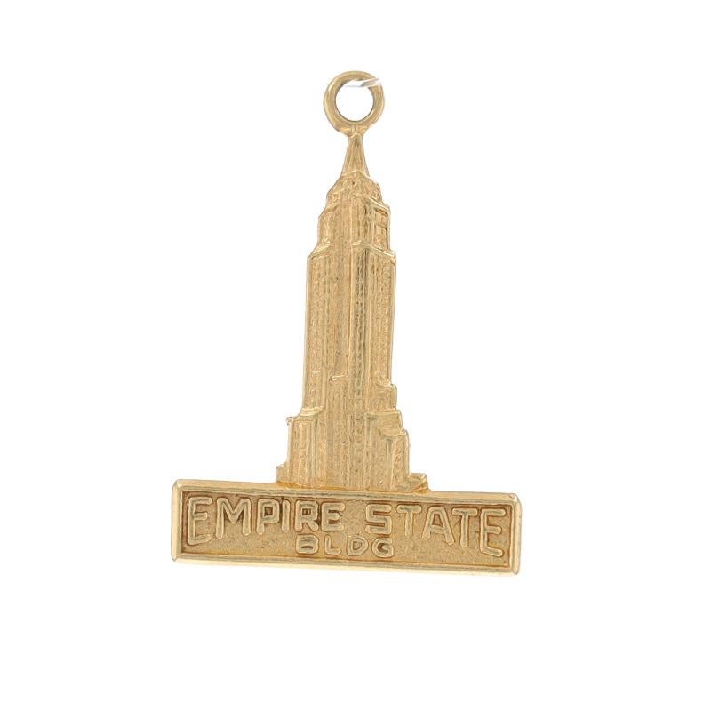 Metal Content: 14k Yellow Gold

Theme: Empire State Building, New York City

Measurements

Tall (from stationary bail): 27/32