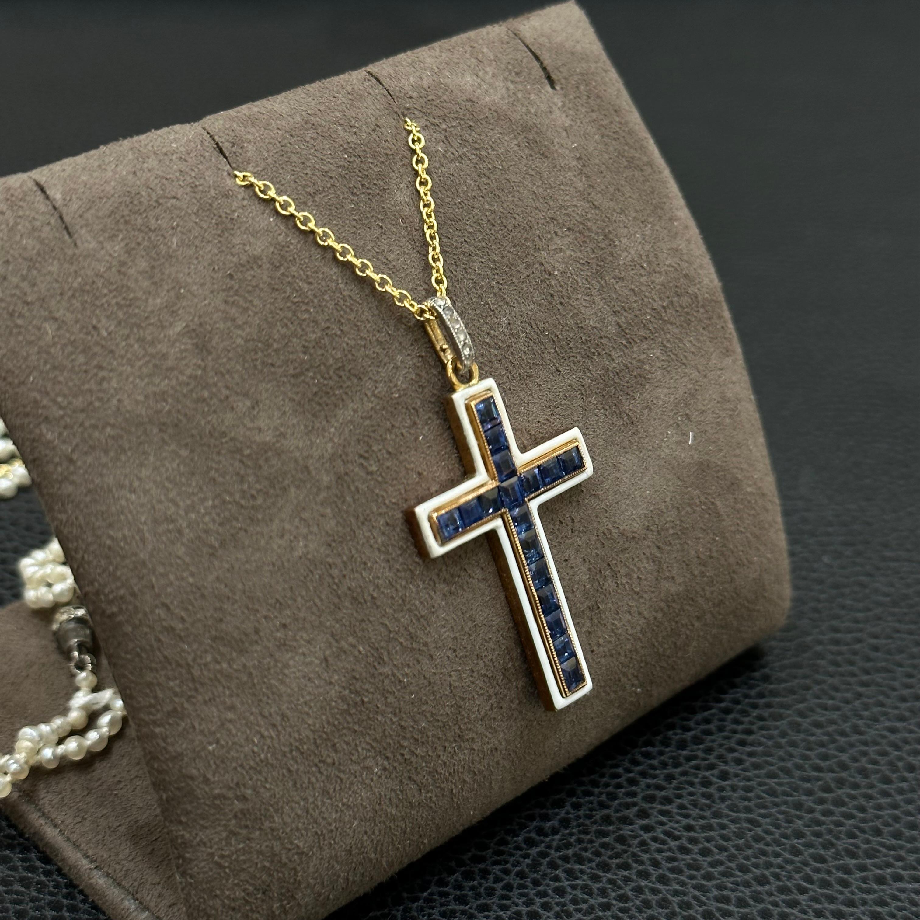 18K Yellow Gold, Sapphire and White Enamel Cross by LaCloche Freres, Paris ca. 1900. Comes with a Yellow Gold 1.5mm Cable Link Chain 18