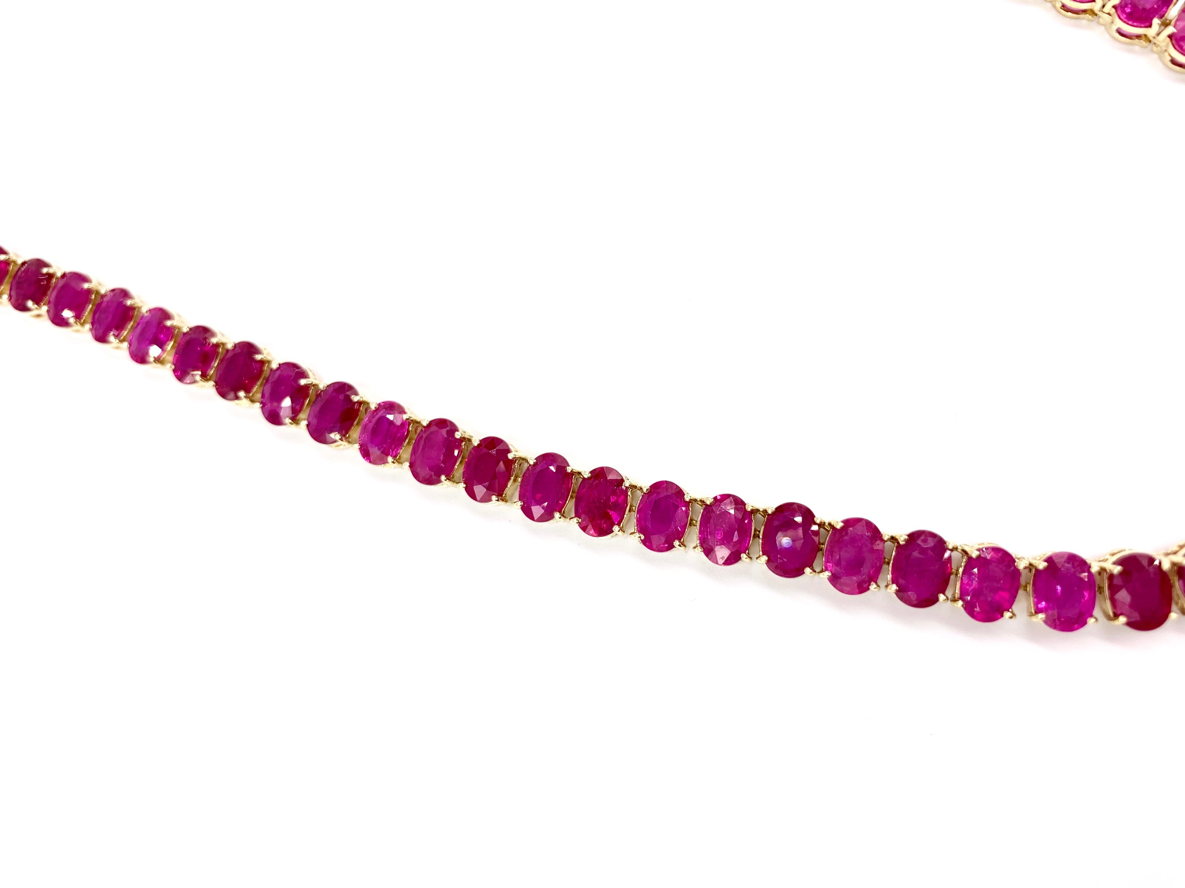 Women's Endless Oval Ruby Necklace in Yellow Gold For Sale