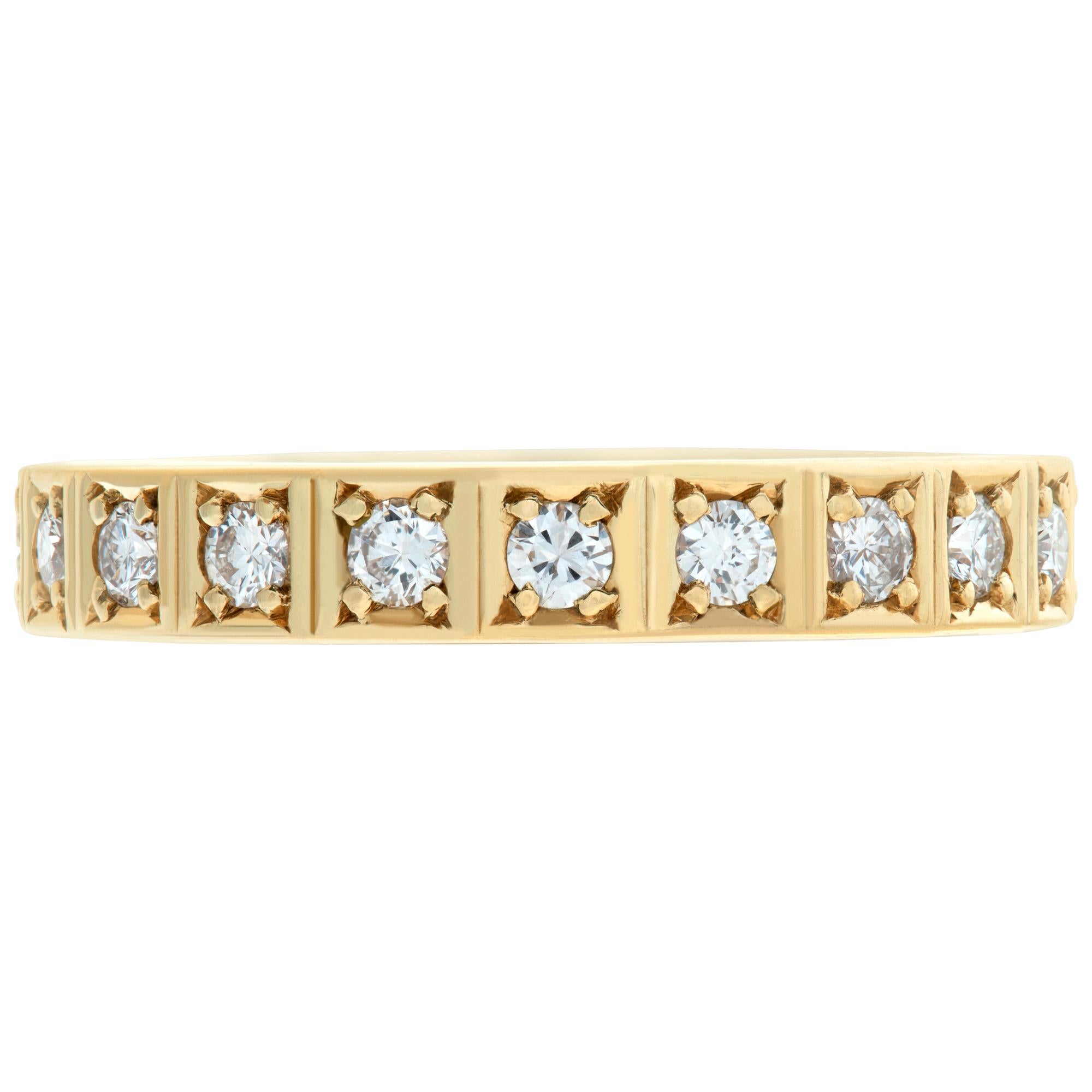 Adorable 14k yellow gold eternity band with approximately 0.60 carats in G-H Color, VS-SI Clarity round diamonds. Size 6, width 3mm.
