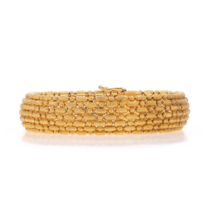 Metal Content: 18k Yellow Gold

Necklace Style: Fancy Bead
Bracelet Style: Chain Link
Fastening Type: Tab Box Clasp with One Side Safety Clasp
Features: Textured Exterior with Smoothly Finished Interior

Measurements

Length: 7 1/2
