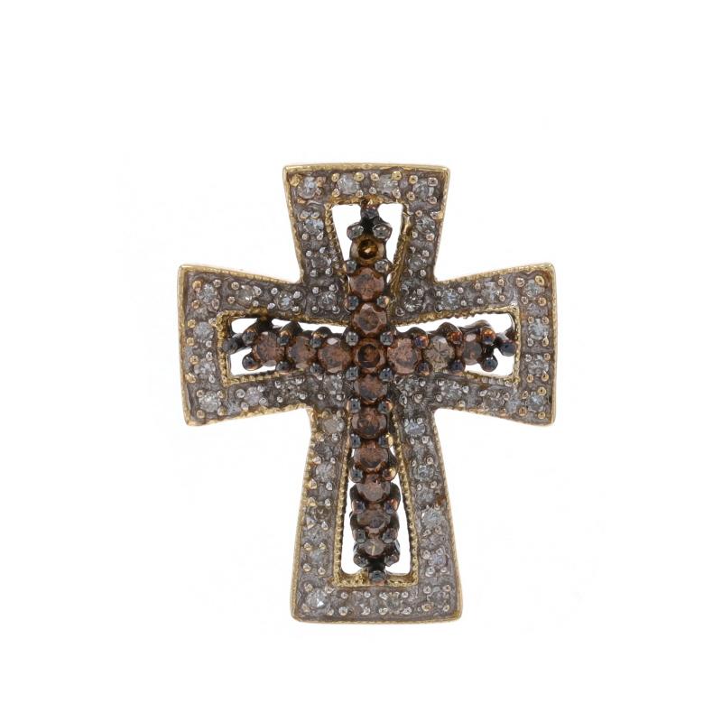 Metal Content: 14k Yellow Gold & 14k White Gold

Stone Information

Natural Diamonds
Carat(s): .50ctw
Cut: Round Brilliant & Single
Color: Fancy Brown & I - J
Clarity: SI1 - I1

Total Carats: .50ctw

Theme: Cross, Faith
Features: Milgrain