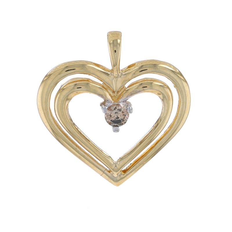 Metal Content: 10k Yellow Gold & 10k White Gold

Stone Information

Natural Diamond
Carat(s): .12ct
Cut: Round Brilliant
Color: Fancy Brown
Clarity: SI2

Total Carats: .12ct

Style: Solitaire
Theme: Heart, Love

Measurements

Tall (from stationary