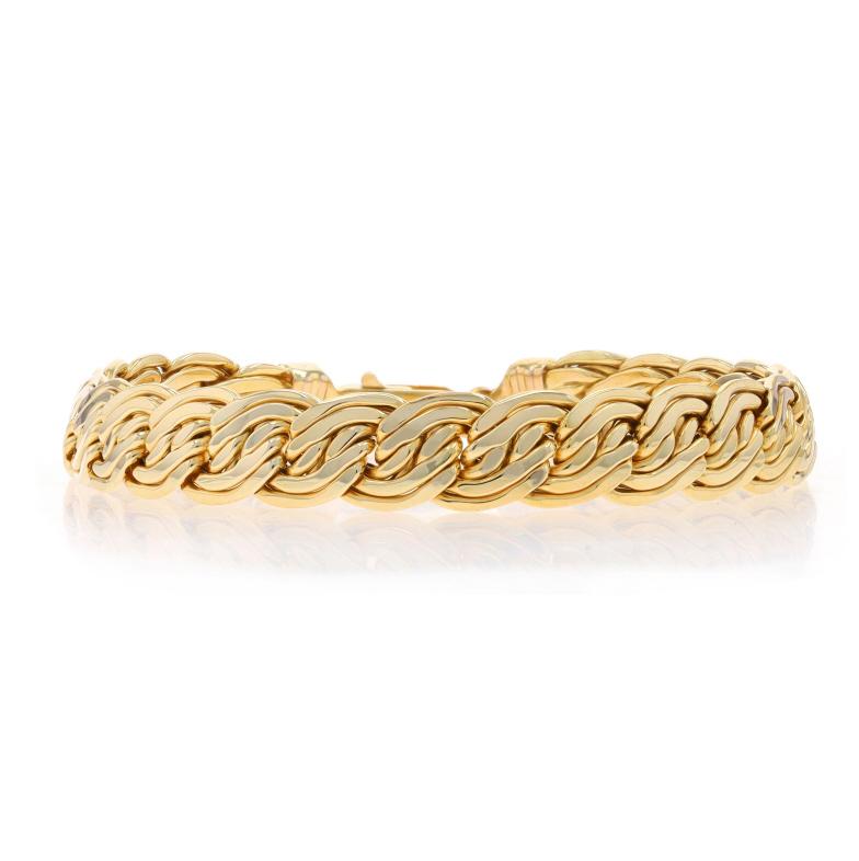Metal Content: 14k Yellow Gold

Chain Style: Fancy
Bracelet Style: Chain
Fastening Type: Lobster Claw Clasp
Theme: Woven Braid

Measurements

Length: 7 1/4