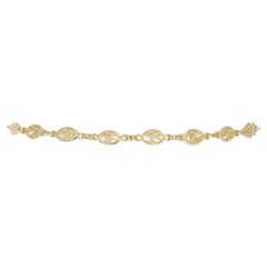 Bracelet à maillons fantaisie en or jaune 9 1/4" - cheville à volutes 14k Italie