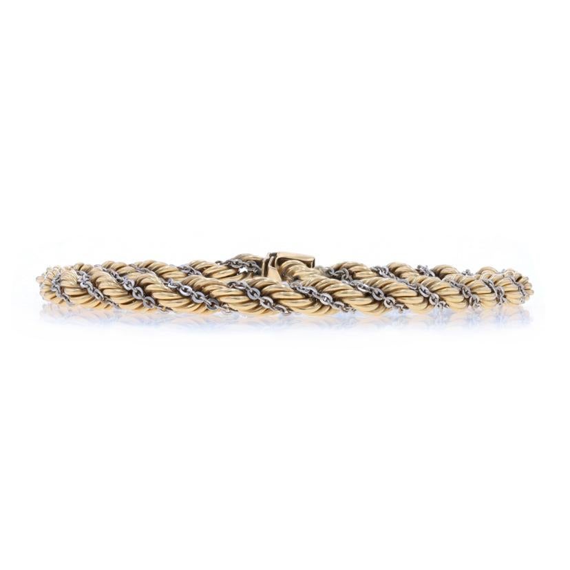 Metal Content: 14k Yellow Gold & 14k White Gold

Chain Style: Rope & Flat Cable
Bracelet Style: Fancy Twist Chain
Fastening Type: Tab Box Clasp with One Side Safety Clasp

Measurements
Length: 8