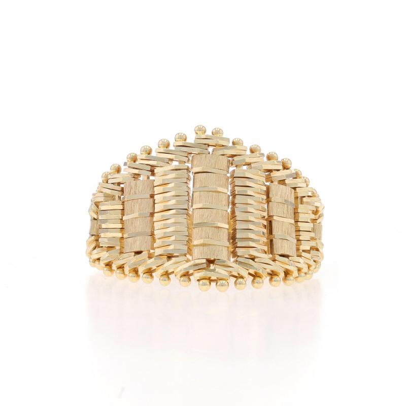 Size: 7

Metal Content: 14k Yellow Gold

Style: Chain Statement Band
Features: The woven chain areas articulate while the solid shank remains in a fixed position.

Measurements

Face Height (north to south): 19/32