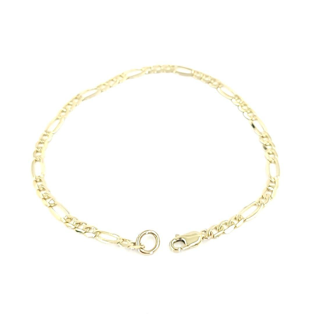 14 Karat Yellow Gold 4mm Figaro Chain Bracelet Measuring 8 Inches Long with Lobster Clasp. Finished Weight Is 4.7 Grams.
