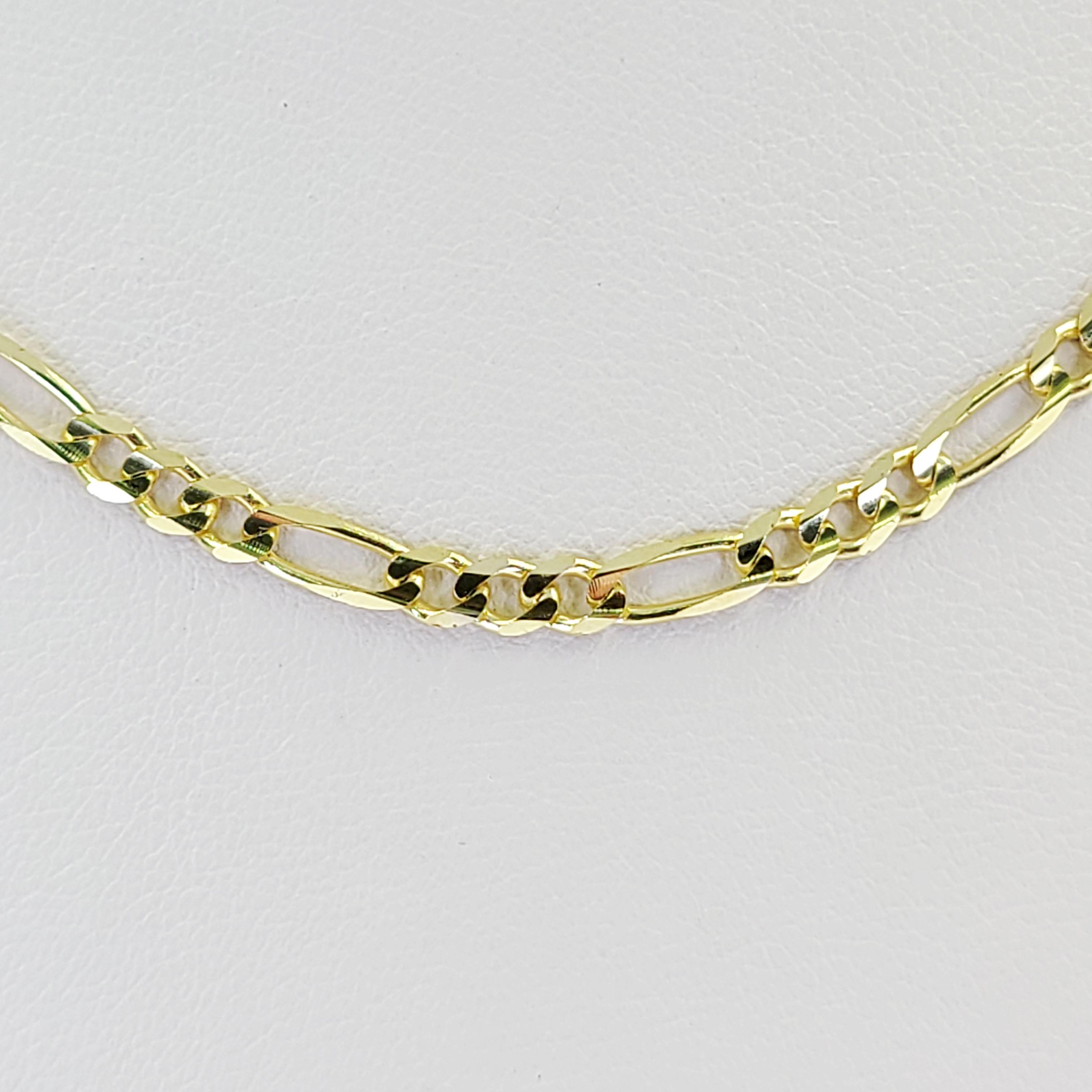 14 Karat Yellow Gold 3mm Figaro Chain Measuring 16 Inches Long. Finished Weight Is 5.7 Grams. Made in Italy.