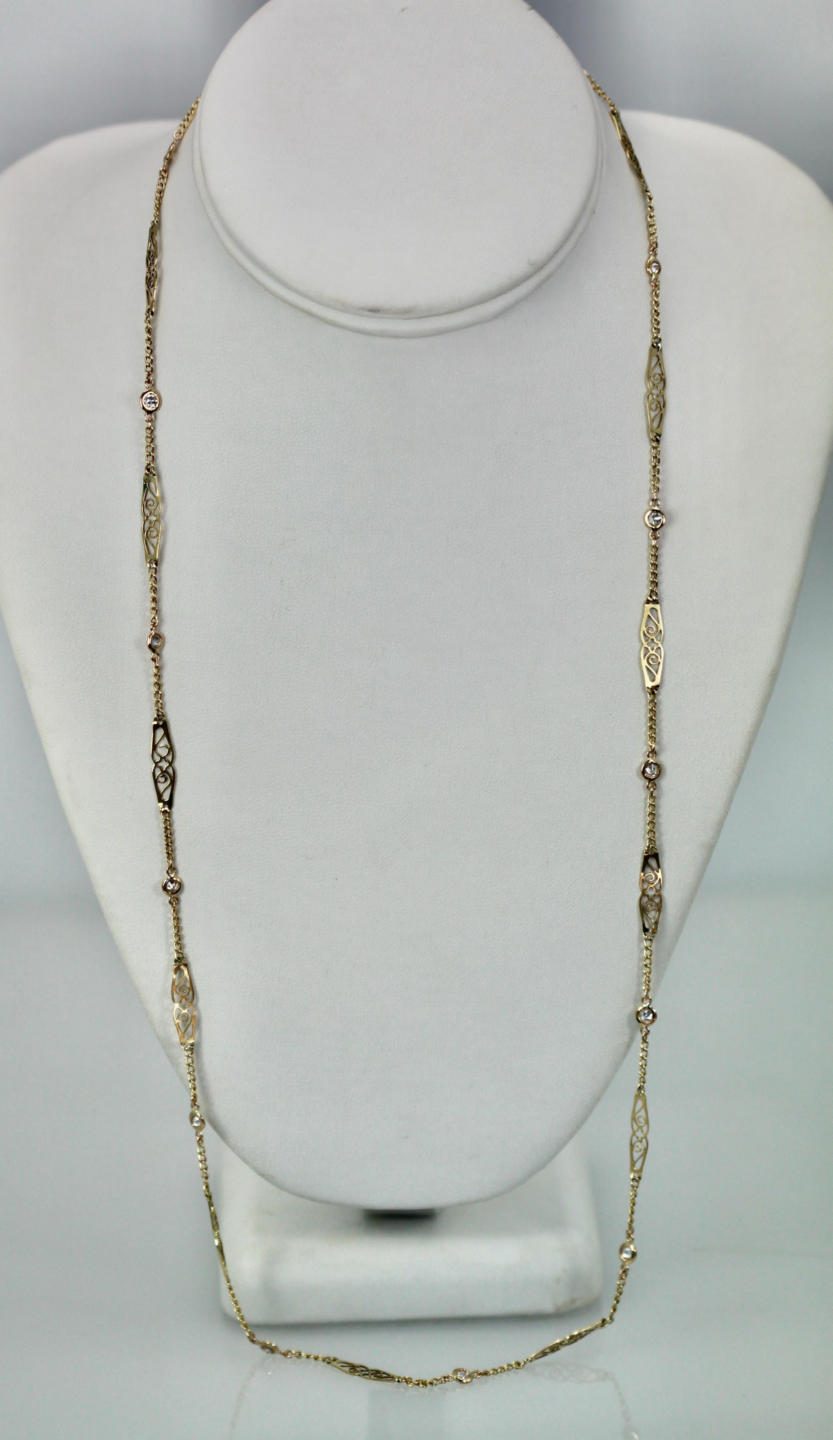 Yellow Gold filigree 14K long Chain studded with Diamonds In Excellent Condition In North Hollywood, CA