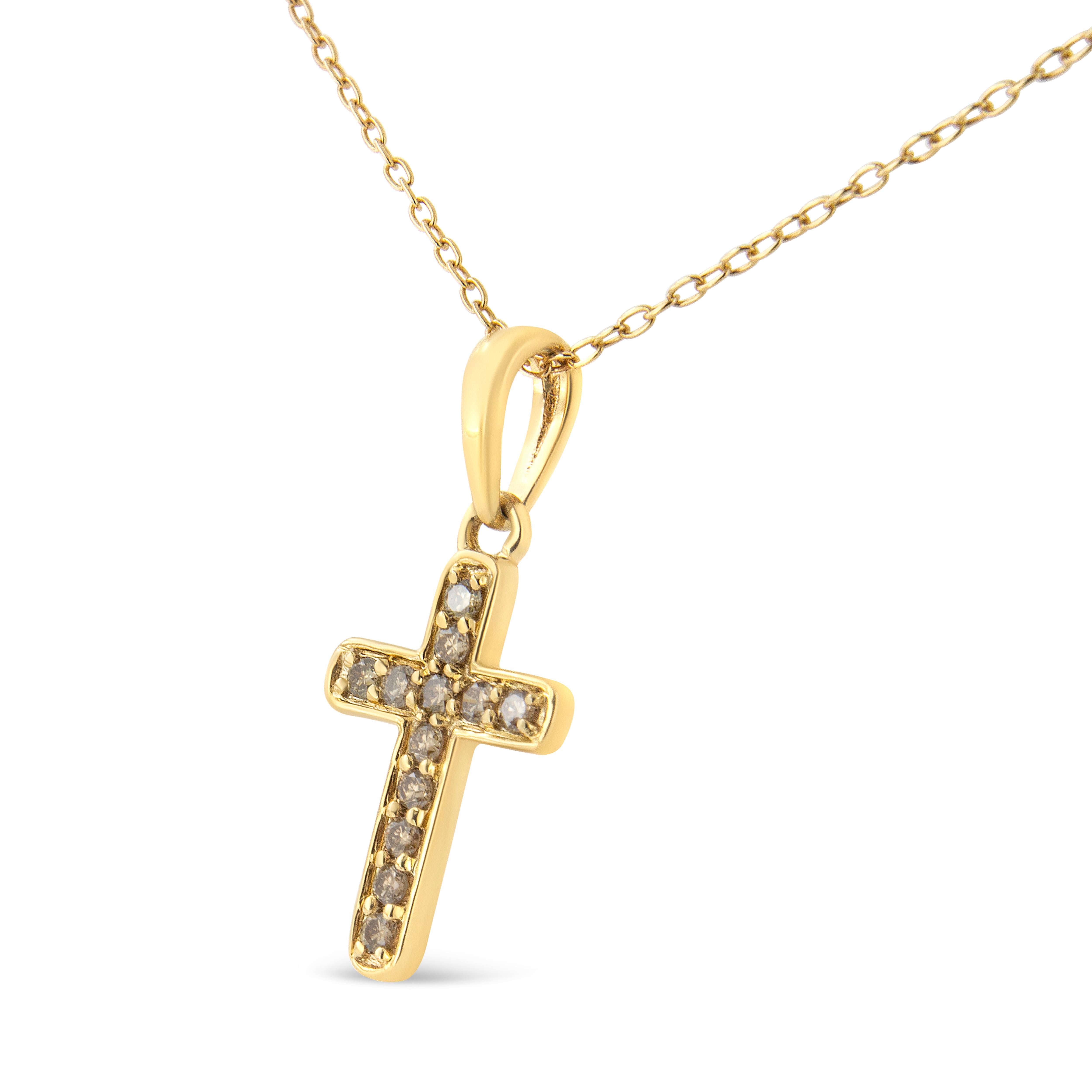 Celebrate your faith with this divine 10kt yellow gold plated 925 sterling silver cross necklace. This pendant is embellished with 12 round cut champagne color diamonds in classic shared prong settings. The pendant has diamonds totaling 1/4 carat