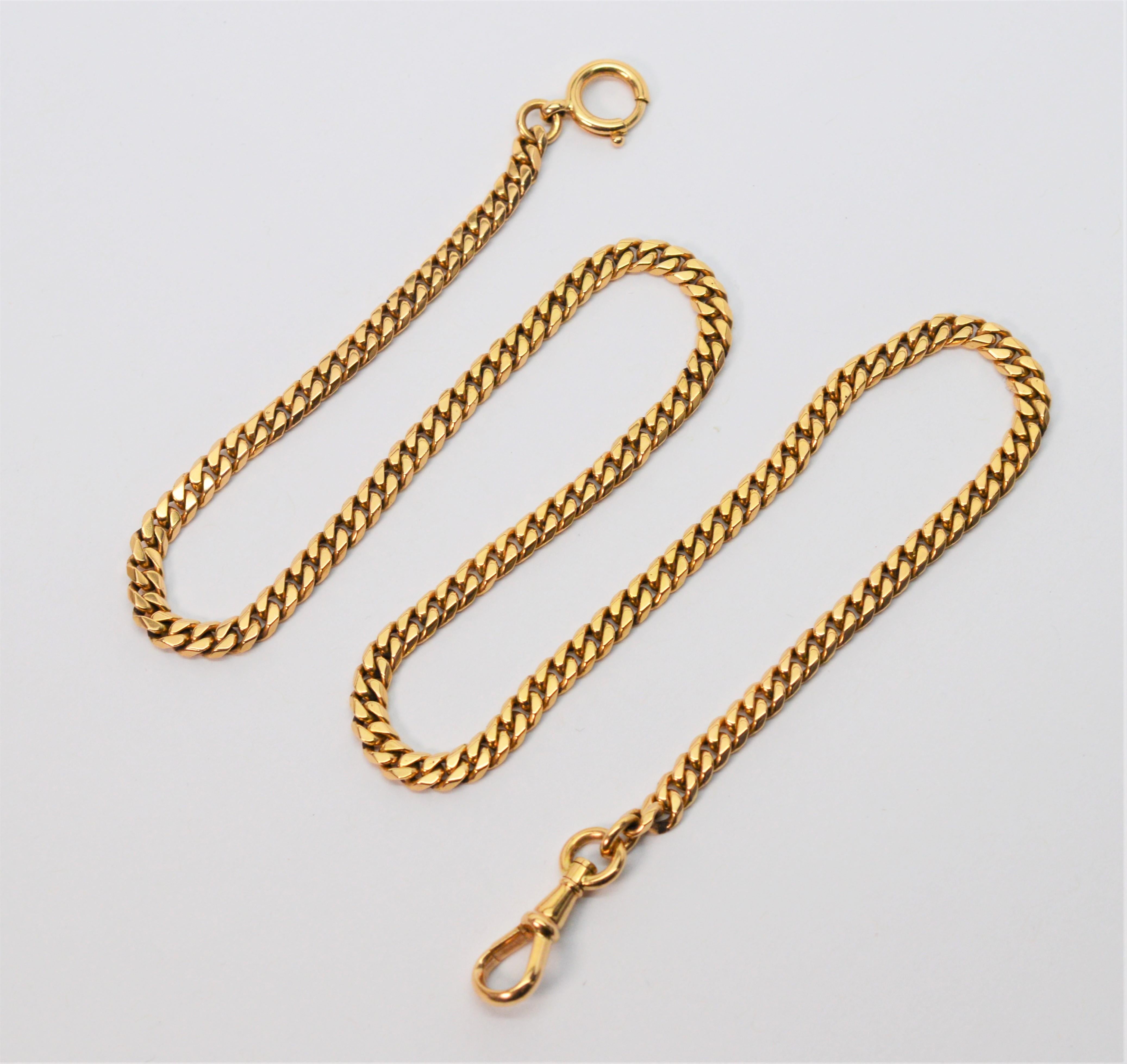 In fourteen karat 14K yellow gold, this vintage 17.75 inch pocket watch chain will regally accessorize a favorite gold pocket watch in your collection. Heavier gauge at a 3.75 mm width this classic flat curb style chain is outfitted with a swivel