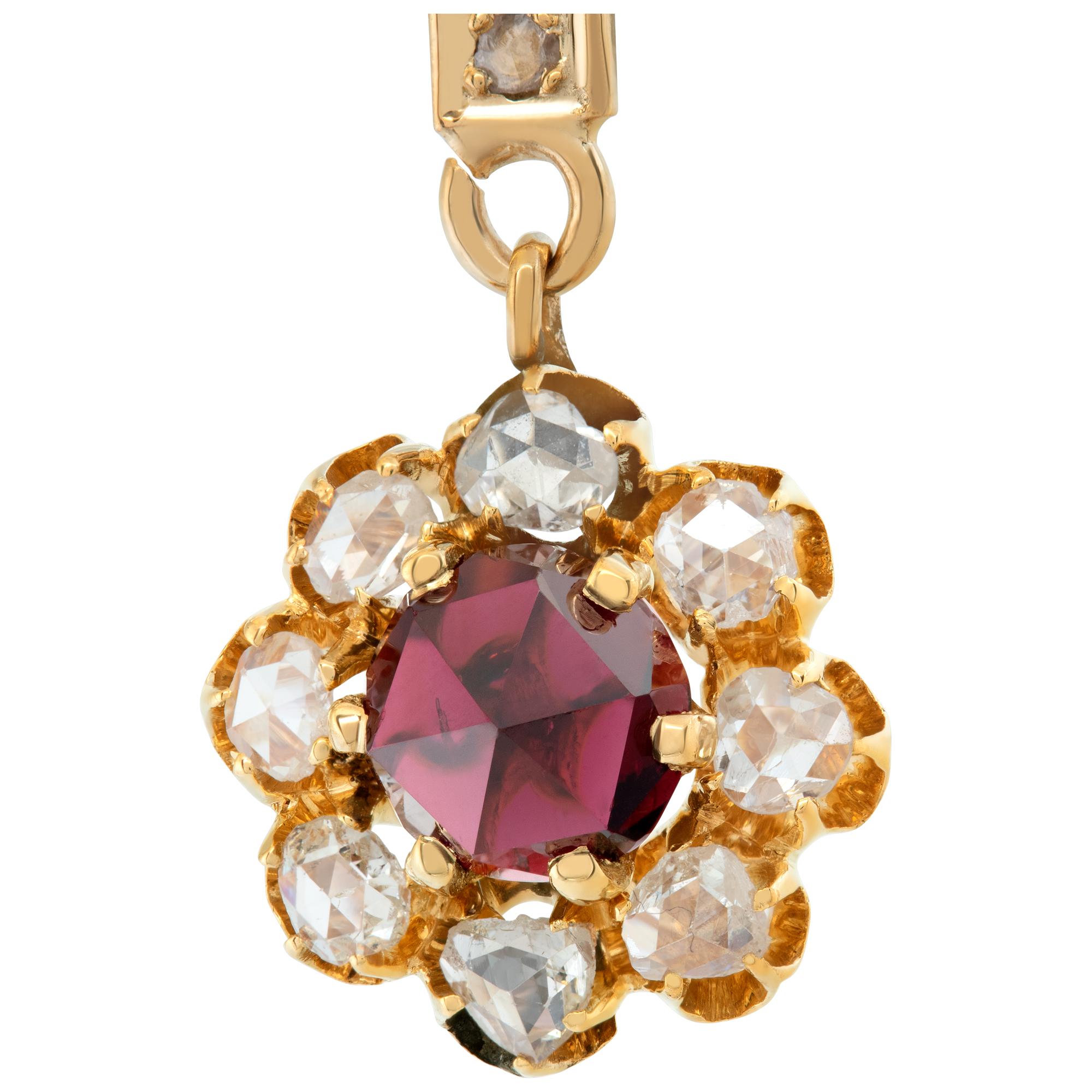Antique 14k yellow gold floral briolette rose cut diamond earrings with approximately 2 carats in diamonds with approximately 2 carats in red garnet. Hanging length: 1.25 inches.
