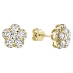 Clous d'oreilles en or jaune avec fleur et diamant