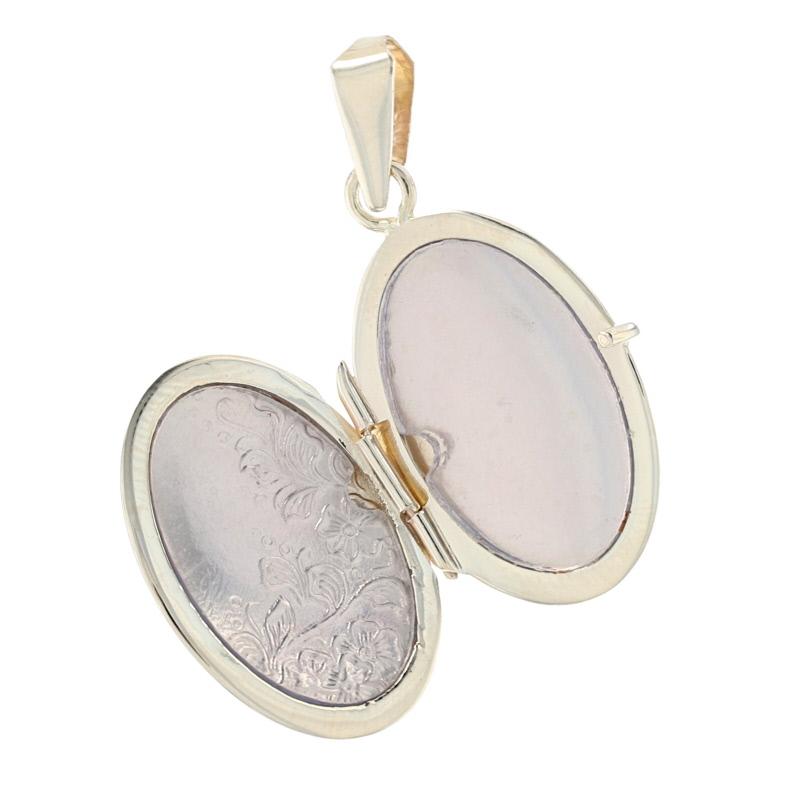 Metal Content: 14k Yellow Gold

Style: Locket
Theme: Flower
Features: Two Photo Frames

Measurements:
Tall (from stationary bail): 1 5/32