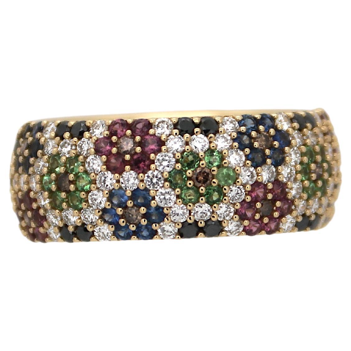 Yellow gold flower pavé ring set with diamonds, sapphire, ruby and peridots