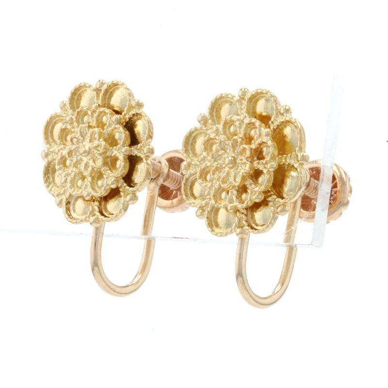 Metal Content: 18k Yellow Gold (earrings) & 14k Yellow Gold (backs)

Style: Stud
Fastening Type: Non-Pierced Screw-On Closures
Theme: Flower, Blossom 
Features: Milgrain Detailing

Measurements: 
Tall: 11/16