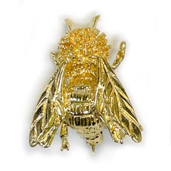 Broche mouche en or jaune