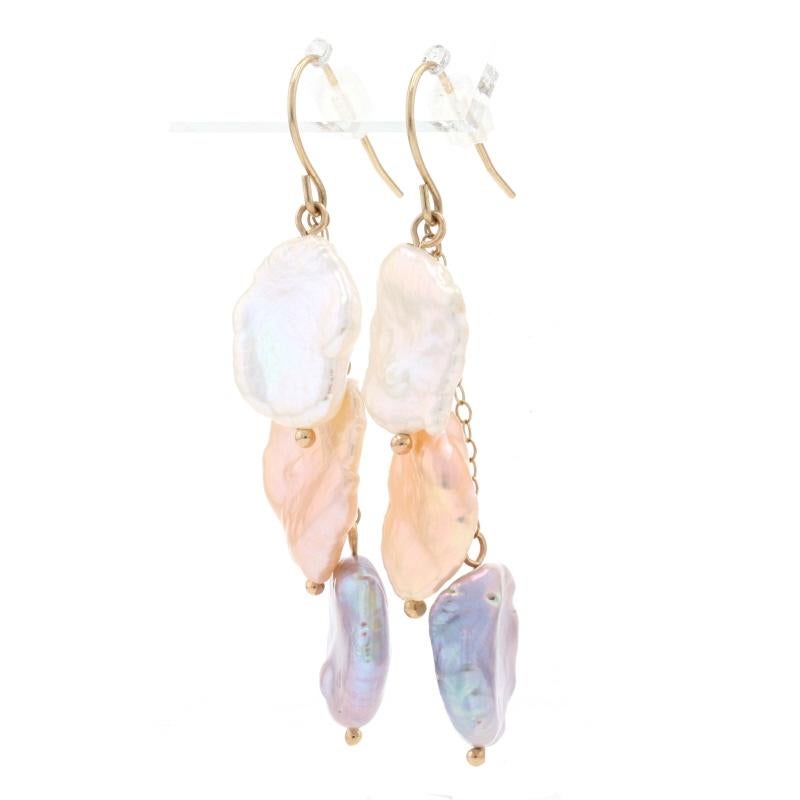 Metal Content: 14k Yellow Gold 

Stone Information: 
Genuine Freshwater Baroque Pearls
Treatment: Dyed 	

Style: Dangle 
Fastening Type: Fishhook Closures 
Features: Two pearls on each earring are suspended on flat cable chains.

Measurements: