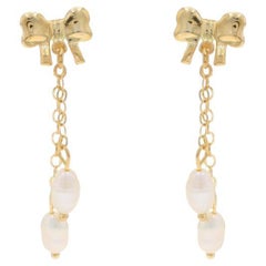 Orecchini pendenti con fiocco di perle d'acqua dolce in oro giallo - Nastro legato 14k - Perforati