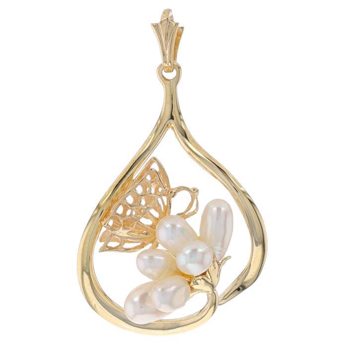 Pendentif fleur papillon en or jaune et perles d'eau douce - Nature 14 carats